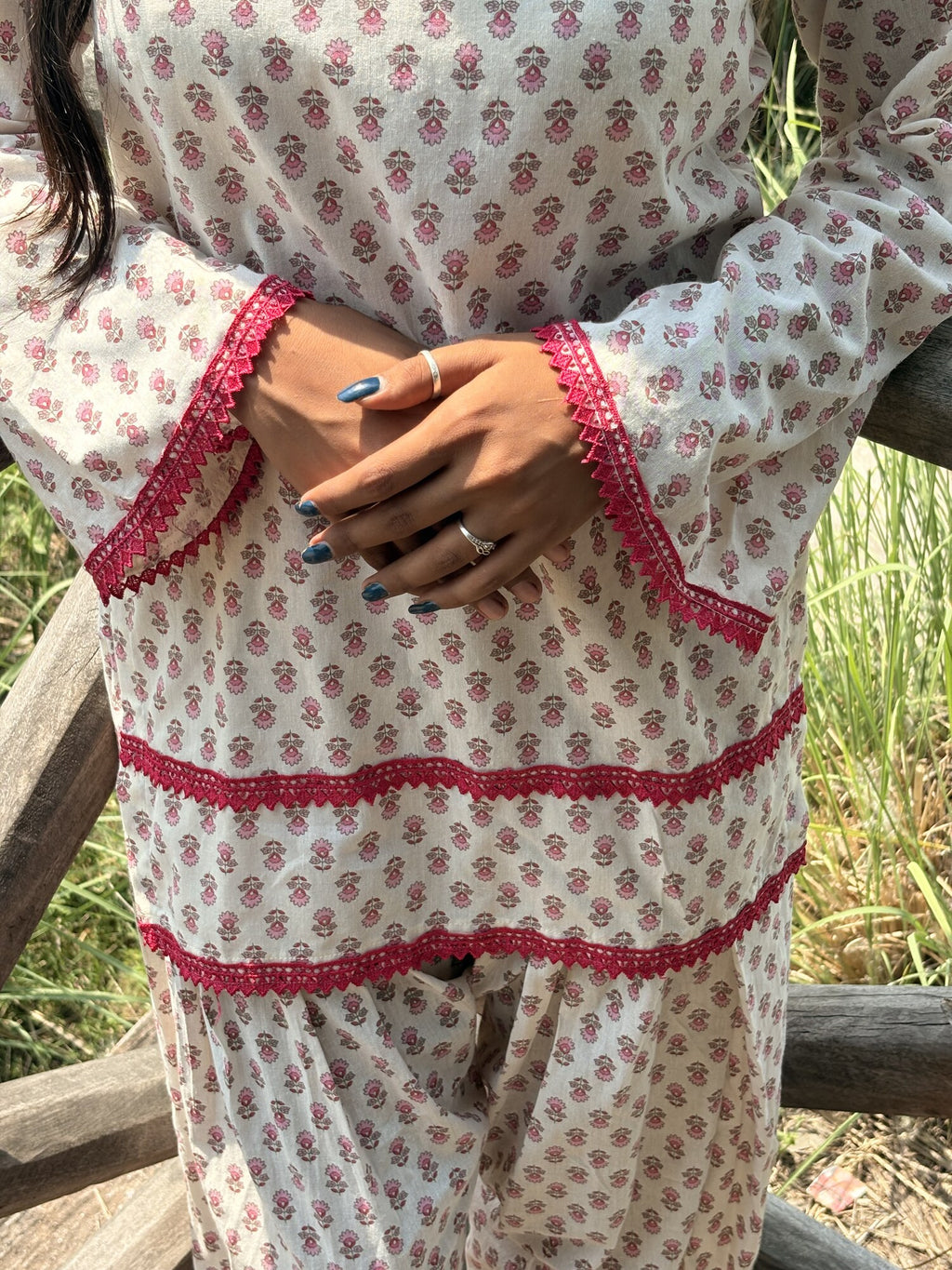 Gulabi Noor 2 ivory kurta set styled outdoors